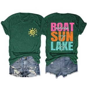Detail of dark green t-shirt with colorful Boat Sun Lake back print and distressed shorts