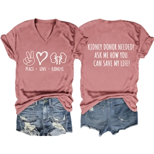 Flat lay of V-neck tee with Peace Love Kidneys print and donor slogan on the back