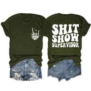 Detail view of olive green t-shirt with SHIT SHOW SUPERVISOR print and skeletal hand