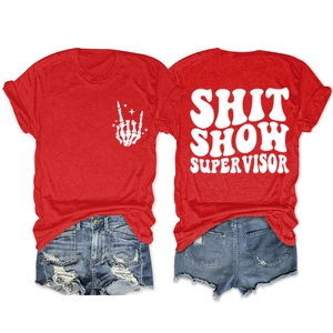 Detail of red t-shirt with Shit Show Supervisor text and bone hand print design