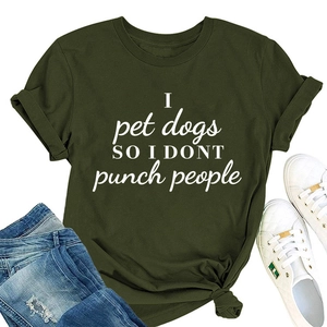 Army green round neck t-shirt with I pet dogs text paired with blue jeans and sneakers