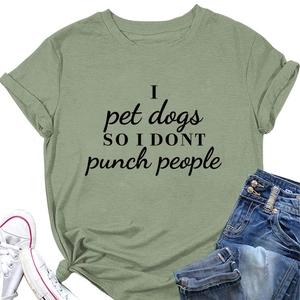 Flat lay of grass green cotton t-shirt with knotted hem and funny dog slogan print