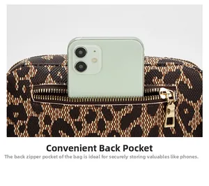 Detailed back zipper pocket on leopard print sports waist bag showing smartphone storage