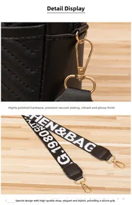 Detail of V-quilted black leather surface with vacuum-plated gold metal hardware and strap