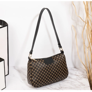 Retro patterned women's shoulder bag with gold hardware and elegant black strap