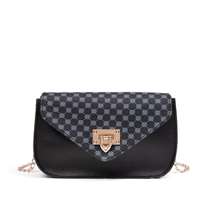 Women's chic crossbody flap bag with monogram pattern and gold lock on white background