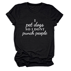 Flat lay of black cotton t-shirt featuring I pet dogs so I don't punch people slogan