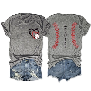 Flat lay of Baseball Mama t-shirt with heart graphic and distressed denim shorts