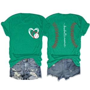 Detail of green t-shirt showing baseball mama print and heart graphic with frayed denim shorts