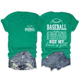 Flat lay of green Baseball Mom T-shirt with white graphic print and distressed denim shorts