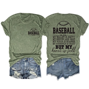 Detail of heather green baseball mom t-shirt with print and blue denim shorts