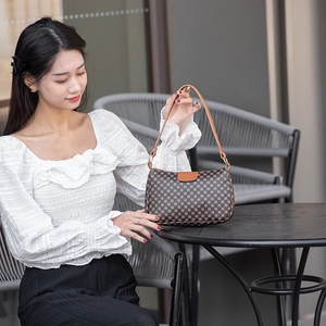 Vintage brown geometric printed shoulder bag for women with leather trim and zip closure