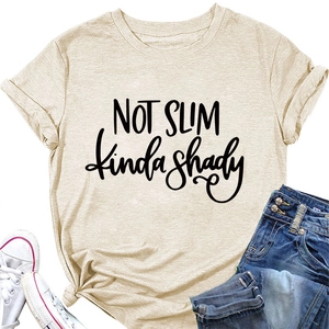 Flat lay of beige crewneck tee with Not Slim Kinda Shady text and denim jeans