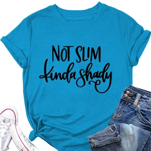 Flat lay of blue T-shirt with NOT SLIM kinda shady slogan, denim shorts and sneakers