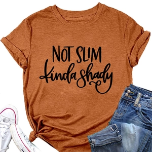 Detailed view of rust orange T-shirt with NOT SLIM kinda shady print on cotton fabric