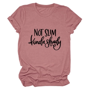 Detail of dusty rose T-shirt fabric with Not Slim kinda shady black slogan print