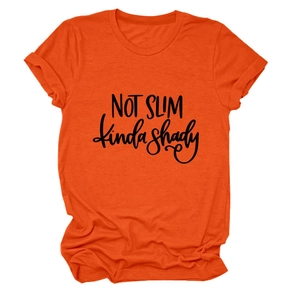 Close-up of rolled sleeves and black slogan print on bright orange cotton T-shirt
