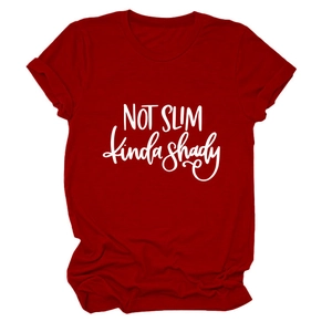 Detail of the cotton fabric texture and white slogan print on a dark red t-shirt