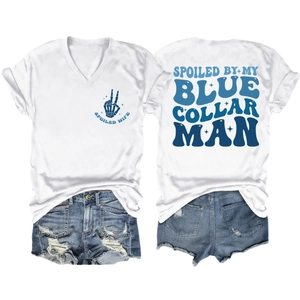 Detail of V-neck white cotton T-shirt with Spoiled Wife print and distressed denim shorts