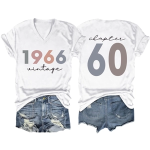 Detail view of 1966 vintage V-neck T-shirt with chapter 60 back print and denim shorts