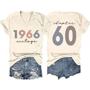 Detail of V-neck T-shirt back showing large grey number 60 and chapter text print