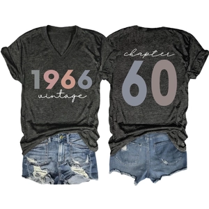 Flat lay of vintage 1966 V-neck T-shirt and distressed denim shorts showing front and back