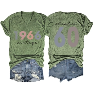 Front and back detail of army green V-neck vintage 1966 t-shirt with denim shorts