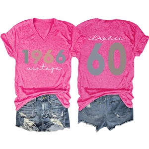 Front and back detail of pink V-neck T-shirt with 1966 vintage print and denim shorts