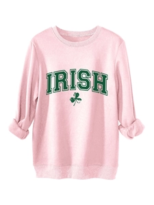 Pink crewneck sweatshirt with green Irish shamrock print and ribbed cuffs detail
