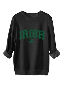 Detail of black sweatshirt showing Irish text and green clover print on fabric