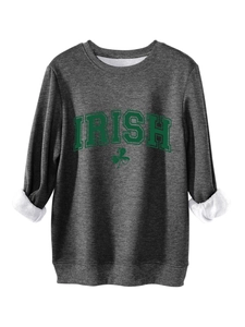 Detail of Irish clover hoodie featuring warm fleece lining and dark green graphic print