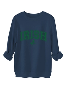Detail of navy blue sweatshirt with green Irish clover lettering and ribbed cuffs