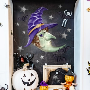Detail of Halloween witch moon wall stickers with black bats and stars on dark background