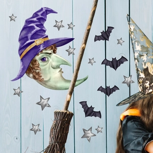 Detail of Halloween witch and bat wall stickers set on a blue wood texture wall decor