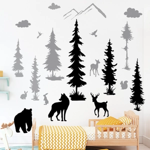 Nordic wall decals featuring forest animals silhouettes with pines and mountains for nursery