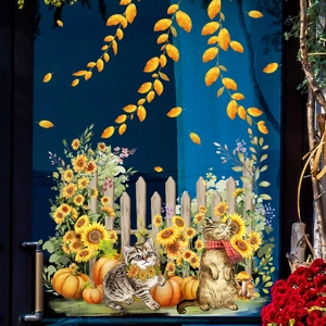 Fall window clings with cute cats, pumpkins, sunflowers, and autumn leaves on glass