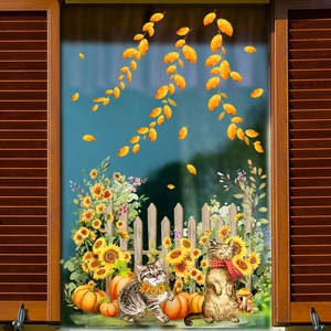 Detail of autumn window clings featuring cute cats, pumpkins, and sunflowers on glass