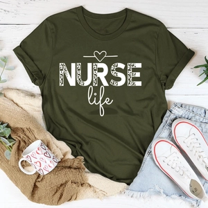 Army green NURSE life t-shirt with leopard print text on white wooden background