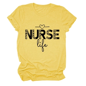 Close-up of yellow t-shirt fabric and NURSE life print with leopard pattern detail