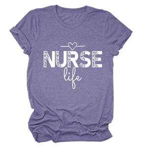 Detail of NURSE Life purple T-shirt showing leopard print text and soft fabric texture