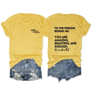 Front and back view of yellow T-shirt with 'YOU matter' print and distressed denim shorts