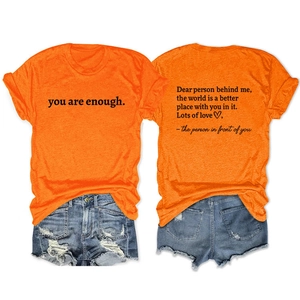 Front and back detail of bright orange cotton t-shirt with social quote printing