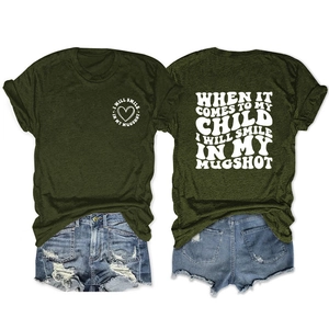 Front and back view of a dark green graphic T-shirt with white lettering and denim shorts