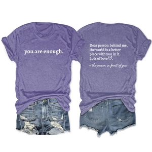 Front and back detail of a purple T-shirt with 'you are enough' print and distressed denim shorts