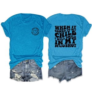 Front and back view of blue cotton T-shirt with I Will Smile In My Mugshot graphic print