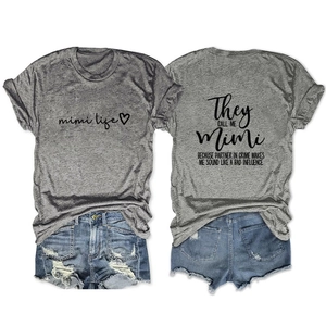 Detail view of grey cotton T-shirt with Mimi Life text and blue denim shorts set