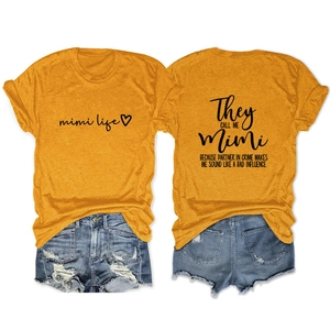 Detail view of ginger yellow mimi life t-shirt and distressed denim shorts set