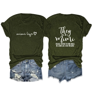 Detail view of olive green Mimi Life t-shirt with white graphic print and cotton texture