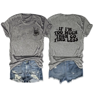 Flat lay of gray letter print t-shirt and ripped blue denim shorts set for summer