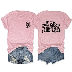 Detail of pink Sassy Mom slogan t-shirt back print and distressed denim shorts